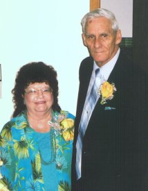Mom and Dad ready to cut the cake