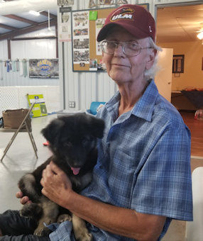 Ken holding the new puppy